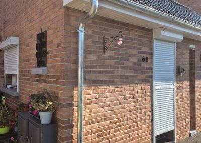 Facade d'une maison, travaux de zinguerie